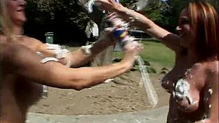 blonde and brunette milfs titty fuck with strapon dildos licking pussies outdoors