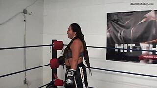 Fiesty feminista battles male in mixed boxing sparring ring.