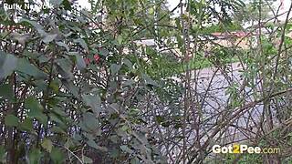 Pretty Brunette Voyeur Pees Softcore in Outdoor Nature