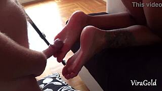 Camilla's beautiful feet get jerked off and covered in hot cum