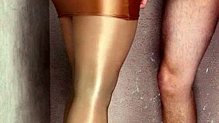 I'm slipping into shiny nylons, eagerly sucking this thick leather lollipop deep