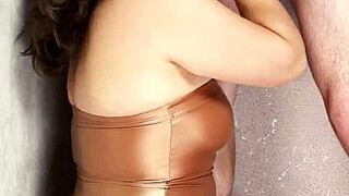 I'm slipping into shiny nylons, eagerly sucking this thick leather lollipop deep