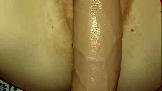 Soft petite redhead's tight pussy devours massive dildo in closeup solo play