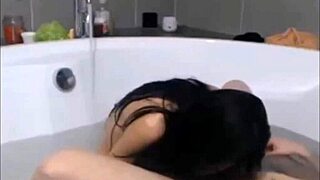 This cute brunette's long hair wraps tight around cock for teasing webcam hairjob fun