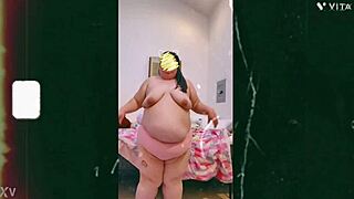 mature cougar with saggy tits dances topless seductively on webcam