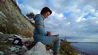 sofi goldfinger bound against sea reads book in intense pov bondage session