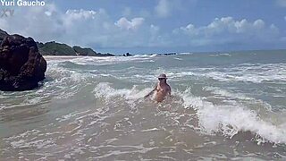 yuri gaucho wife flashes tits in public nudist beach