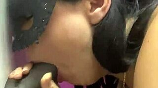Sneaky gloryhole blowjob with her lips wrapped tight around stranger cock
