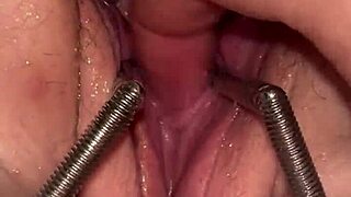 fist queen's pussy stretched wide by metal ring extreme