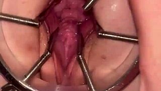 fist queen's pussy stretched wide by metal ring extreme