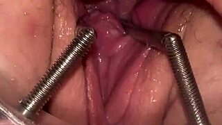 fist queen's pussy stretched wide by metal ring extreme