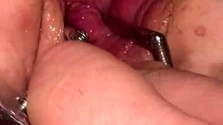 fist queen's pussy stretched wide by metal ring extreme