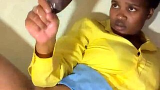 lactating woman milks huge cock on desk with massive cum on tits