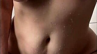 Damn! Tattooed Milf Fingers Wet Pussy in Shower!