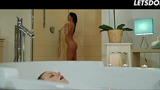 Merry Pie and Emily Brix share intense lesbian passion in bathtub