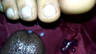 Ebony feet deliver explosive cumshot footjob!
