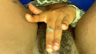 ebony babe indulges in creamy solo pussy play