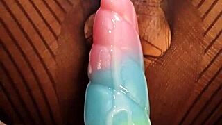 Bad dragon dildo stretches wet hairy pussy up close