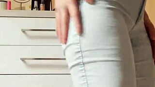 Petite Blonde Strips Tight Jeans Teasingly?