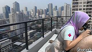 Hijab nurse sneaks rooftop for wet public blowjob, skirt up high