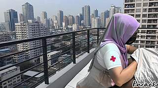 Hijab nurse sneaks rooftop for wet public blowjob, skirt up high