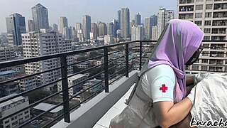 Hijab nurse sneaks rooftop for wet public blowjob, skirt up high
