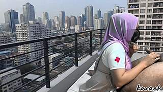 Hijab nurse sneaks rooftop for wet public blowjob, skirt up high