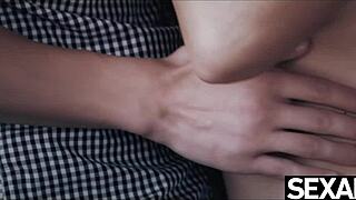 Her big tits bounce wildly during intense doggystyle pounding