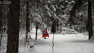 red hood tempts deep in snowy forest on christmas adventure
