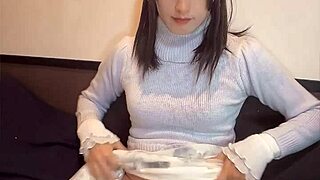 a cute japanese crossdresser masturbates quietly on cam