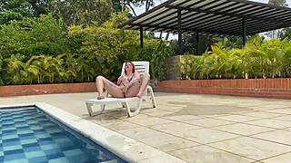 Naughty Redhead Rides Big Cock Poolside
