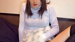 a cute japanese crossdresser masturbates quietly on cam