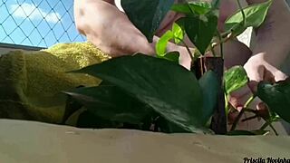 naked outdoor flashing big tits and miniskirt on balcony watering plants