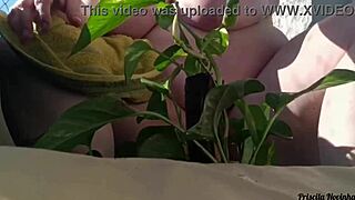 naked outdoor flashing big tits and miniskirt on balcony watering plants
