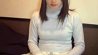 a cute japanese crossdresser masturbates quietly on cam