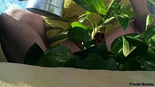 naked outdoor flashing big tits and miniskirt on balcony watering plants
