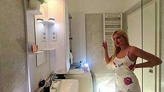 Super sexy blonde coed slips into satin nightie for bathroom tease ritual