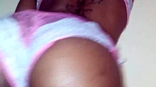 lola sways seductively stripping ebony curves in teasing dance