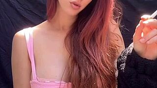 Artemisia Enjoys a Sultry Outdoor Smoking Session with Her Long Hair