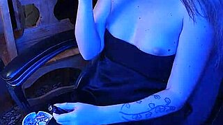 Mistress Enjoys Smoking Her Cigarette