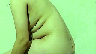 smooth indonesian babe tries new satin skirt flashing her big ass and pussy