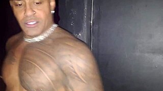 danni cardillo milf sucks big black cock through gloryhole piercing