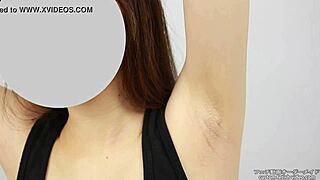 The Japanese beauty uncovers her smooth armpits in a tantalizing Asian fetish ritual unfolding slowly