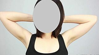The Japanese beauty uncovers her smooth armpits in a tantalizing Asian fetish ritual unfolding slowly