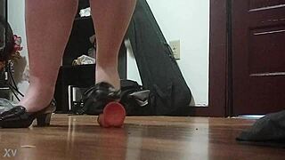 Crush that throbbing cock under my sharp heels!