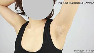 The Japanese beauty uncovers her smooth armpits in a tantalizing Asian fetish ritual unfolding slowly