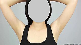 The Japanese beauty uncovers her smooth armpits in a tantalizing Asian fetish ritual unfolding slowly