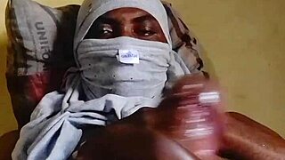 horny african strokes his juicy monster cock solo in bedroom