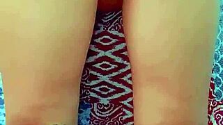 Brunette fills her ass with coconut oil