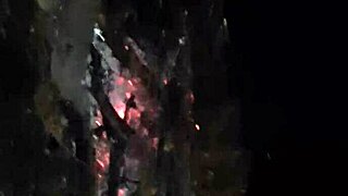 Lick my pussy in the woods by the fire while friends smoke